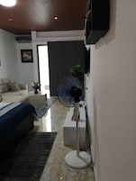 Deluxe Studio | Individually decorated, individually furnished, blackout drapes