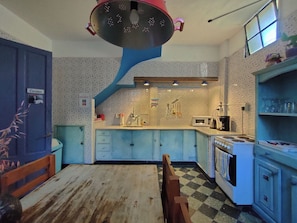 Fridge, microwave, oven, cookware/dishes/utensils