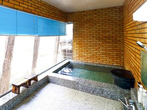 A bathroom with a bathtub, a window with blinds, and a tiled floor. - Nonsmoking Standard twin with toilet / Kanazawa Ishikawa (Kanazawa)