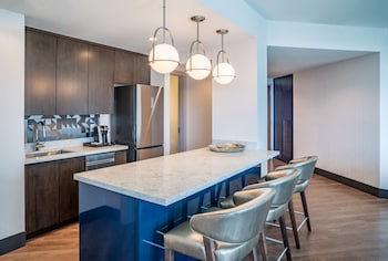 In-room safe, desk, laptop workspace, blackout drapes at Hyatt Centric Las Olas Fort Lauderdale