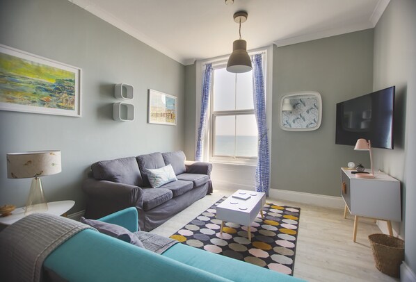 Apartment, 3 Bedrooms | Living area | 50-inch flat-screen TV with digital channels, Smart TV - Sea Mist (Hastings)