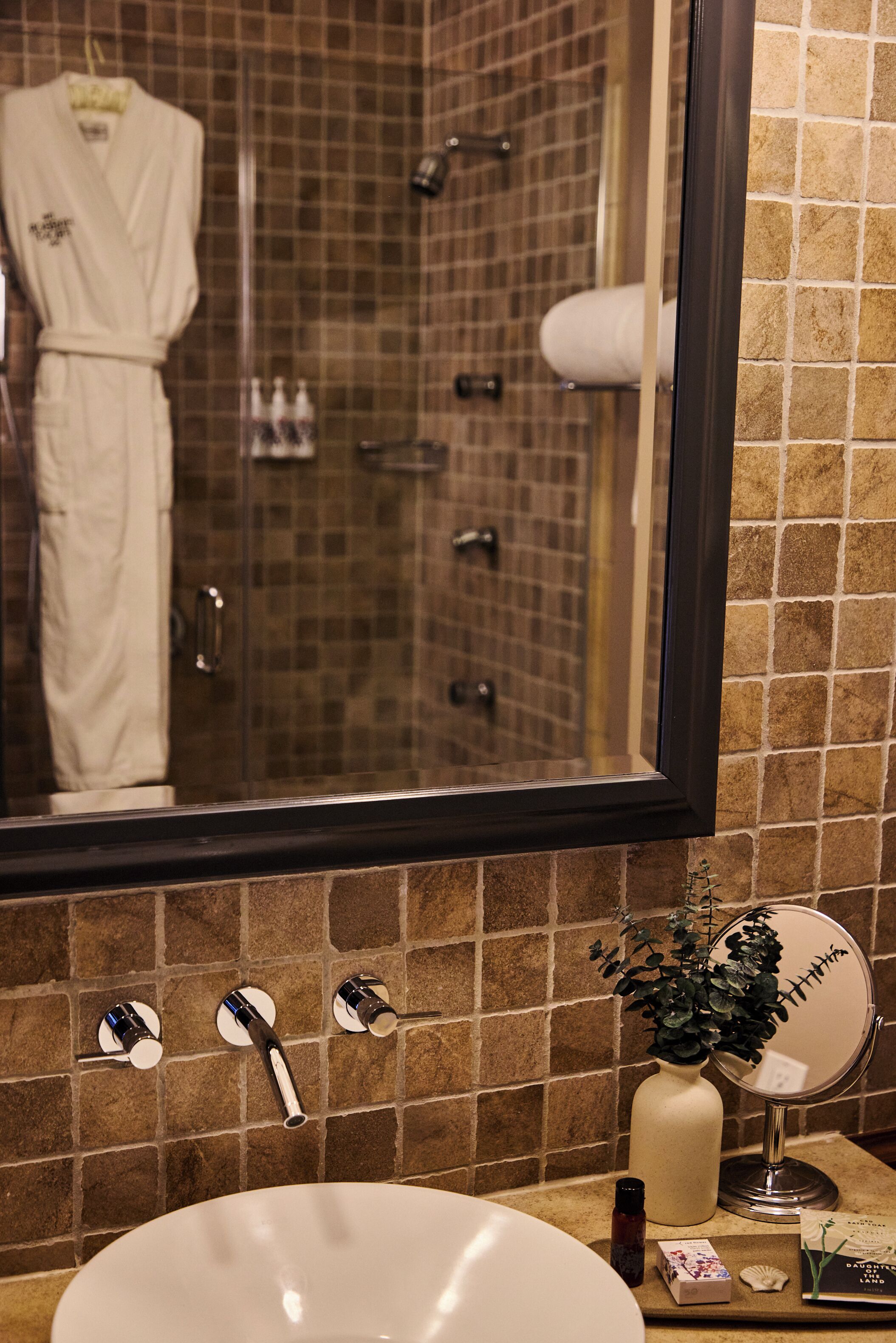 Combined shower/tub, designer toiletries, hair dryer, bathrobes