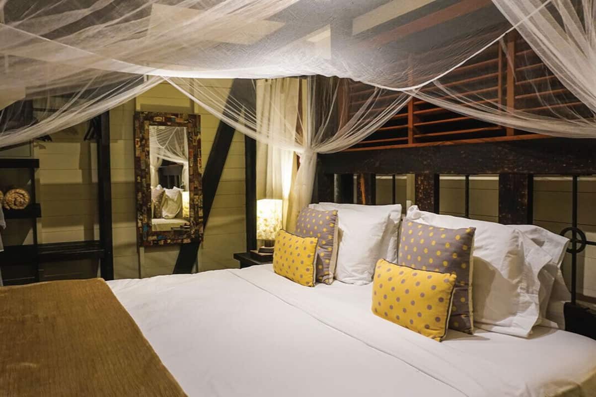 Luxury Suite, 1 King Bed, Ocean View, Beachfront | 2 bedrooms, in-room safe, individually decorated, individually furnished