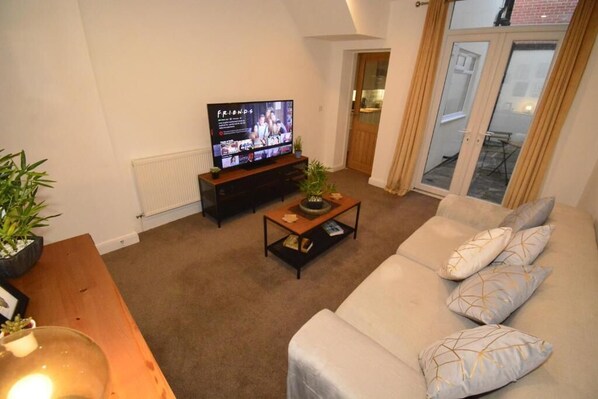 Superior-Apartment | Wohnzimmer | Plasmafernseher