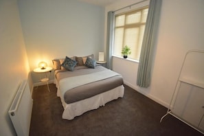 Apartamento superior | 1 quarto, individualmente decorados, individualmente mobiliados
