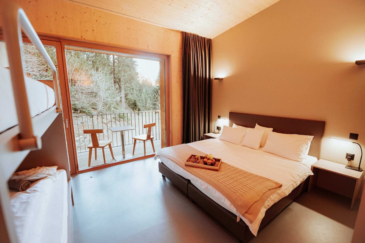Comfort Quadruple Room | In-room safe, individually decorated, individually furnished