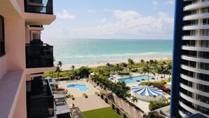 A resort with a pool area, a beach, and a view of the ocean. - Alexander 1211 with Beach Access, 2 pools, sauna (Miami Beach)