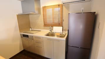 Fridge, microwave, cookware/dishes/utensils