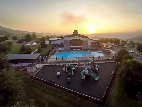 Indoor pool, outdoor pool. Mountainside Villas at Massanutten by Tripforth
