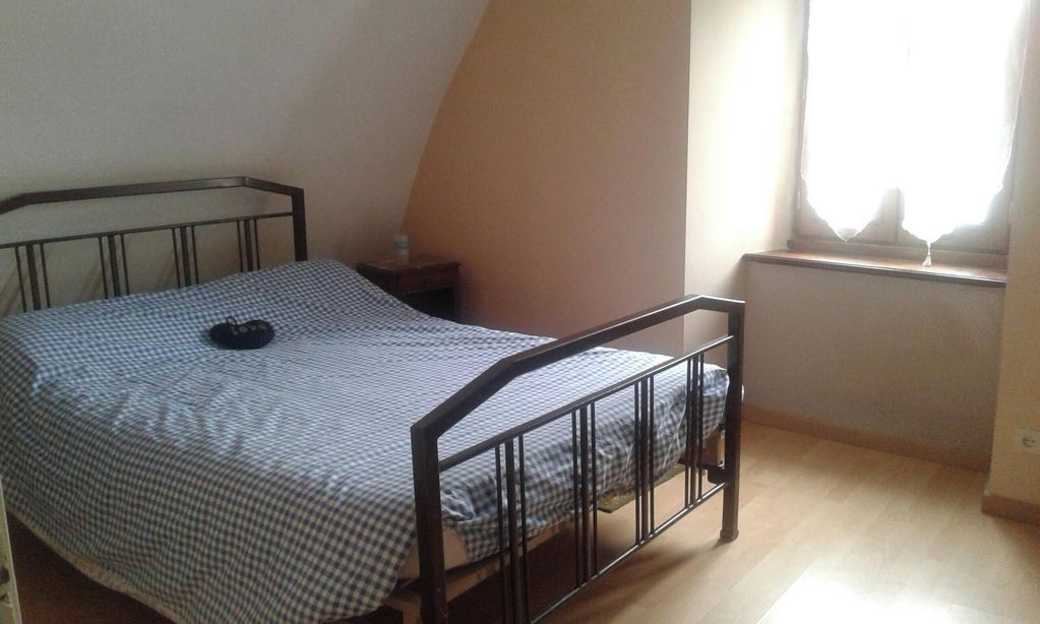 2 slaapkamers, een strijkplank/strijkijzer