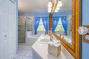 Combined shower/bathtub, hair dryer, towels, soap
