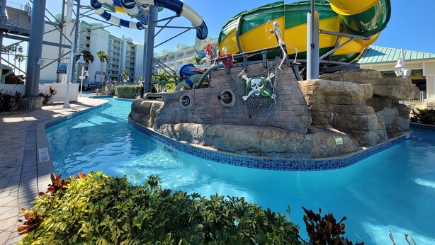 A water park with slides, a pool, and a pirate-themed rock structure. - Waterfront, Harbourside, Water Park, Beach, #5515 (Indian Rocks Beach)