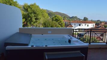 Honeymoon Studio Suite, Partial Sea View (Private Spa Tub) | Private spa tub