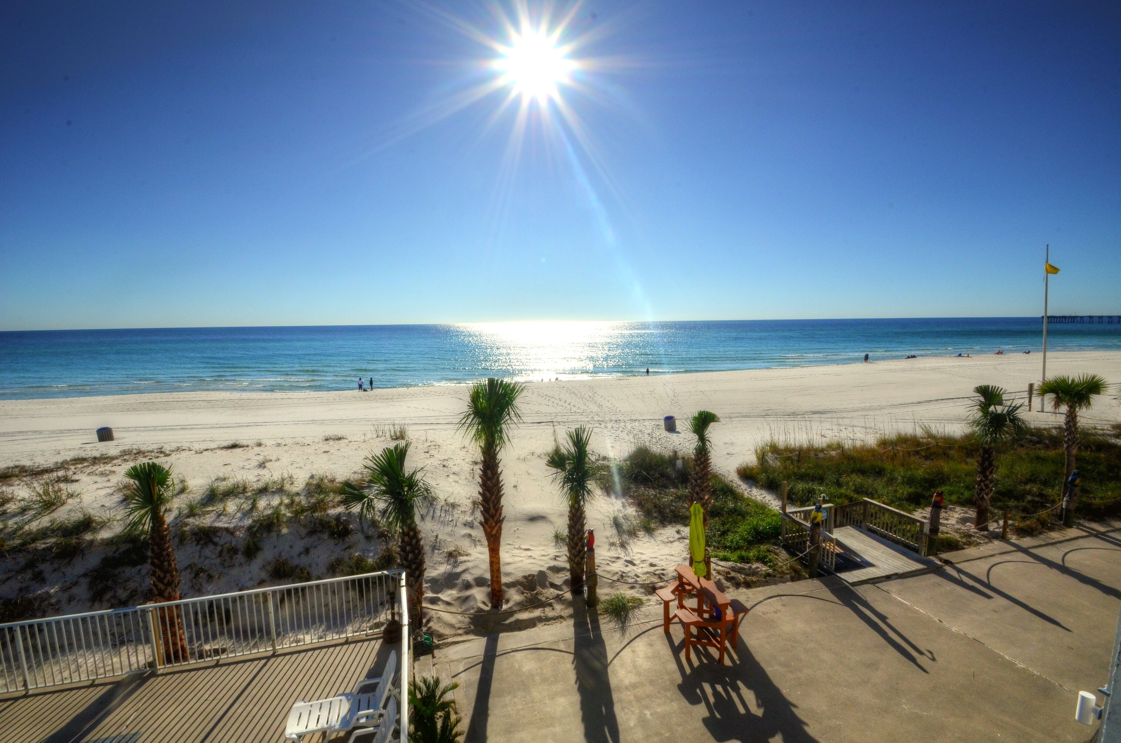 On the beach, sun loungers, beach towels