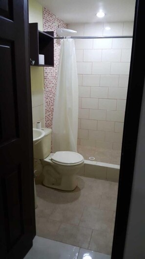 Shower, free toiletries, towels, soap