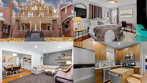 Un edificio de varios pisos de ladrillo con un porche cubierto, un dormitorio con cama y escritorio, una cocina moderna con electrodomésticos de acero inoxidable y un comedor con mesa y sillas de madera.