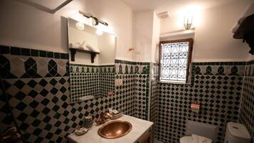 Shower, towels, soap, toilet paper