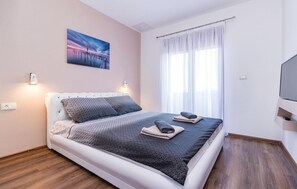 4 Schlafzimmer, Zimmersafe, Reisekinderbett, kostenloses WLAN