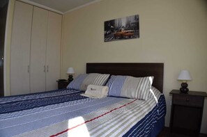 1 habitación, tabla de planchar con plancha, wifi y ropa de cama 