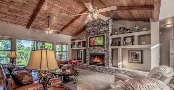 Flat-screen TV, fireplace, DVD player