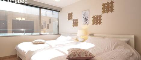 2 عدّة غرف نوم ومكواة/لوح كي وواي فاي مجانًا وملاءات أسرّة