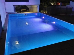 Outdoor pool, pool umbrellas, pool loungers