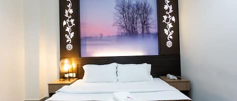 Deluxe Room | Premium bedding, desk, blackout curtains, iron/ironing board