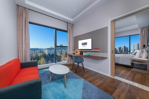 Suite, 1 King Bed (Additional Living Area) | In-room safe, soundproofing, iron/ironing board