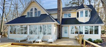 Spacious lakefront home with panoramic views and private beach