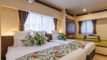 Habitación básica con 2 camas individuales | Wifi gratis y ropa de cama