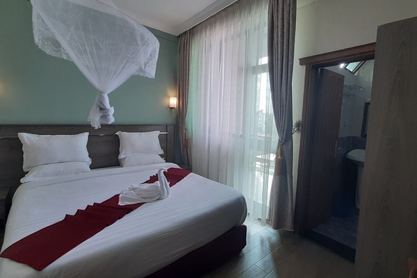 Deluxe Single Room, Balcony, City View | Pillowtop beds, minibar, desk, laptop workspace