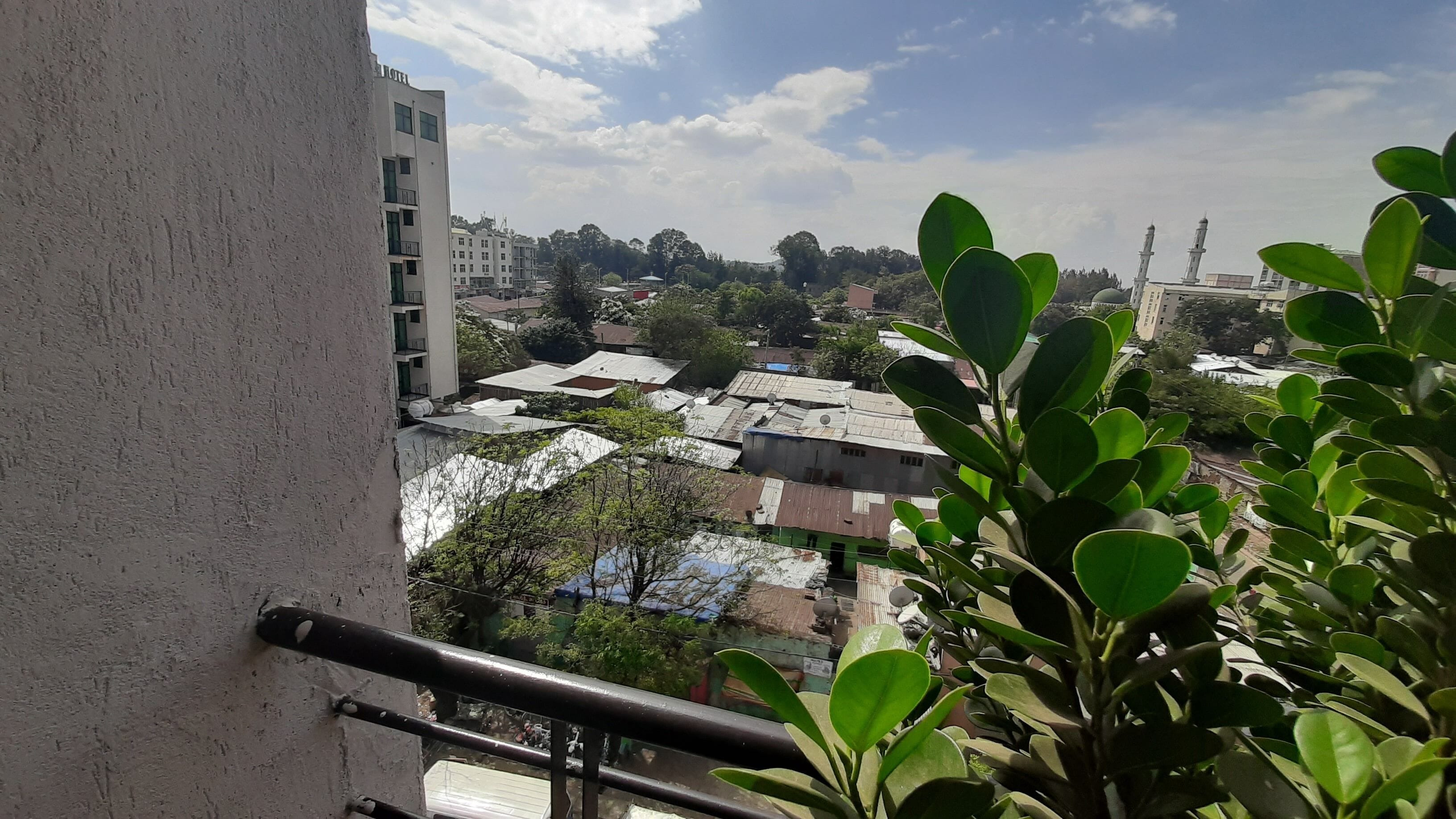 deluxe single room, balcony, city view | city view