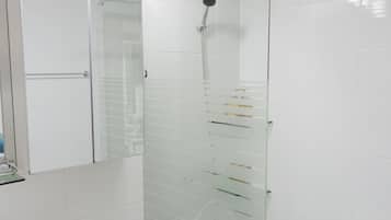 Standard Suite (#2) | Bathroom | Shower, free toiletries, hair dryer, towels
