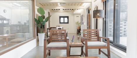 Standard Suite | Living area | Flat-screen TV