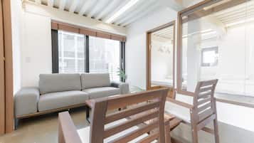 Standard Suite | Living area | Flat-screen TV