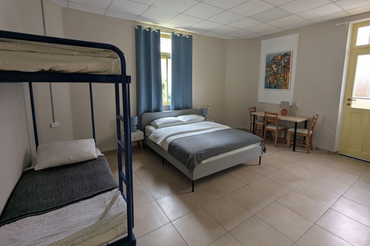 Family Quadruple Room | Laptop workspace, blackout drapes, iron/ironing board, free WiFi