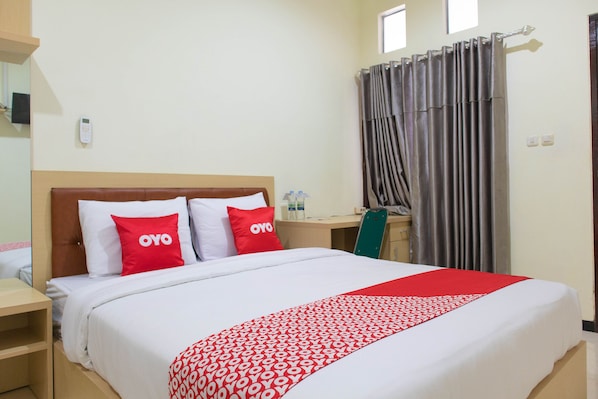 Habitación doble Deluxe | Escritorio, wifi gratis y ropa de cama