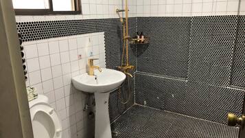 Shower, free toiletries, hair dryer, slippers