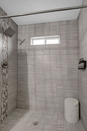 Combined shower/tub, hair dryer, towels, soap