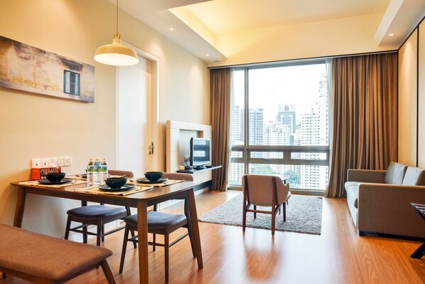 2 Bedroom Apartment | Living area | Flat-screen TV
