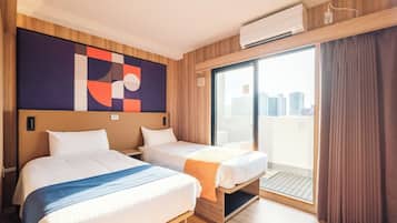 Chambre Deluxe avec lits jumeaux, non-fumeurs | 1 chambre, coffres-forts dans les chambres, bureau