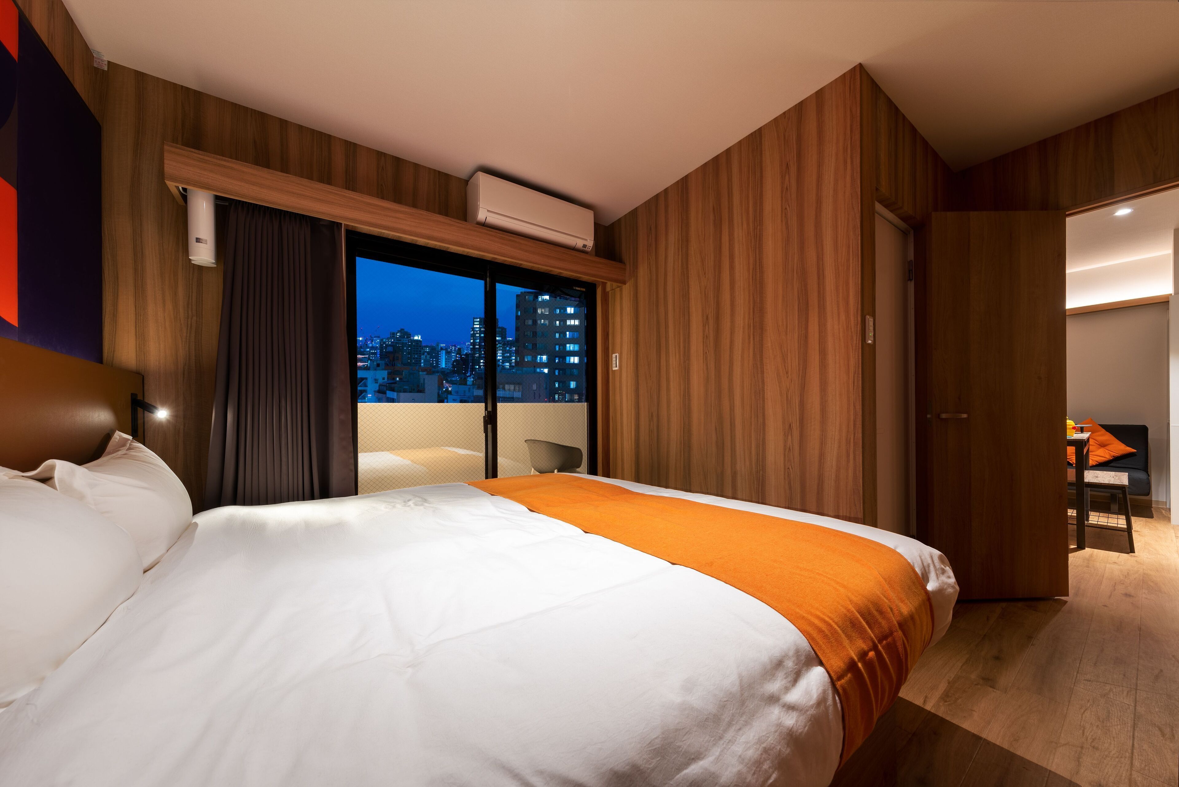 mikan two-bedroom suite, non smoking | in-room safe, desk, laptop workspace, free wifi