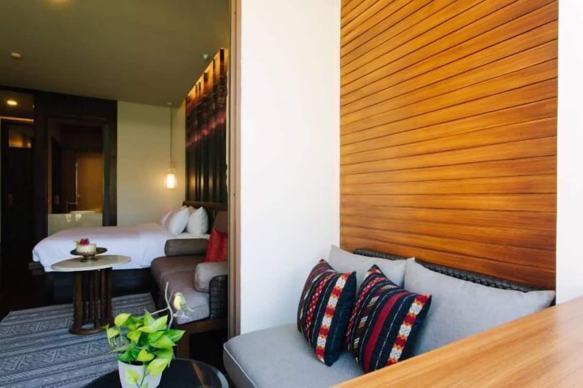 Luxe beddengoed, bedden met traagschuimmatrassen, een minibar