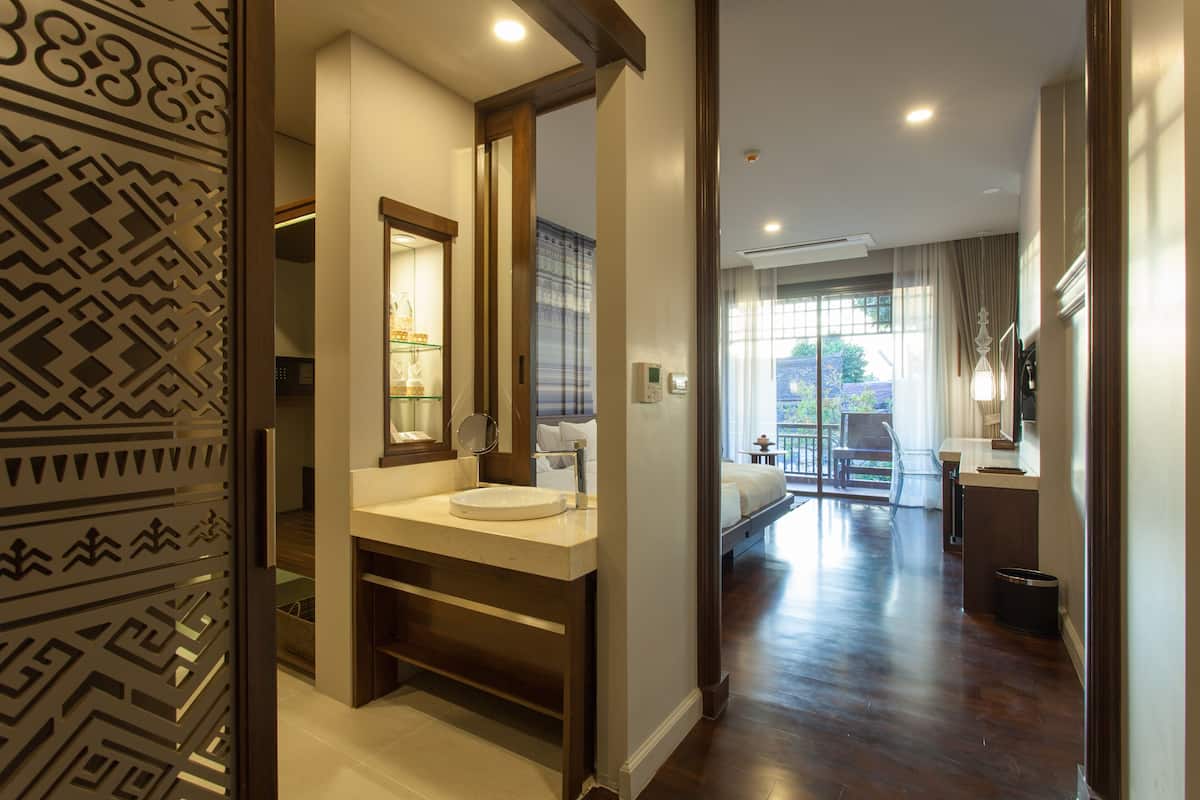 Luxe beddengoed, bedden met traagschuimmatrassen, een minibar