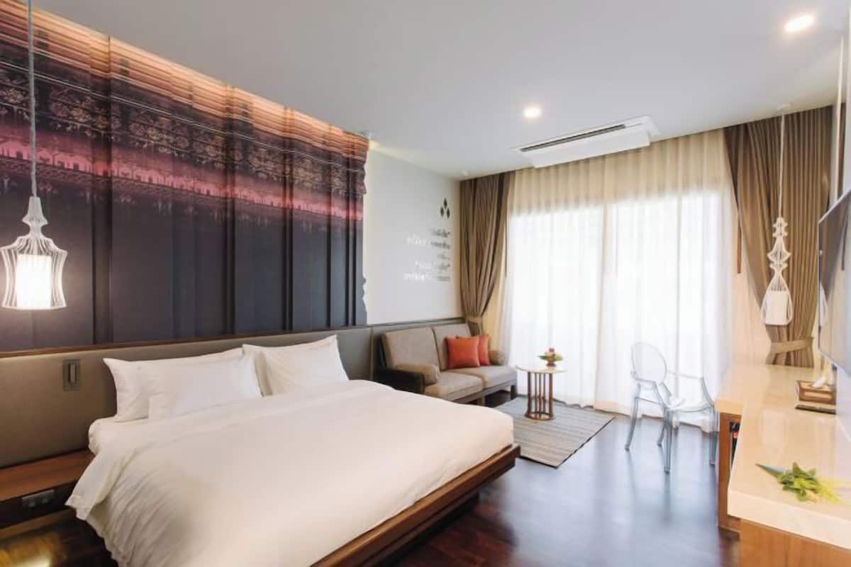 Premium bedding, memory foam beds, minibar, in-room safe