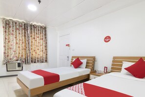 Habitación estándar con 2 camas individuales | Ropa de cama