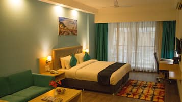 Desk, laptop workspace, blackout curtains, iron/ironing board