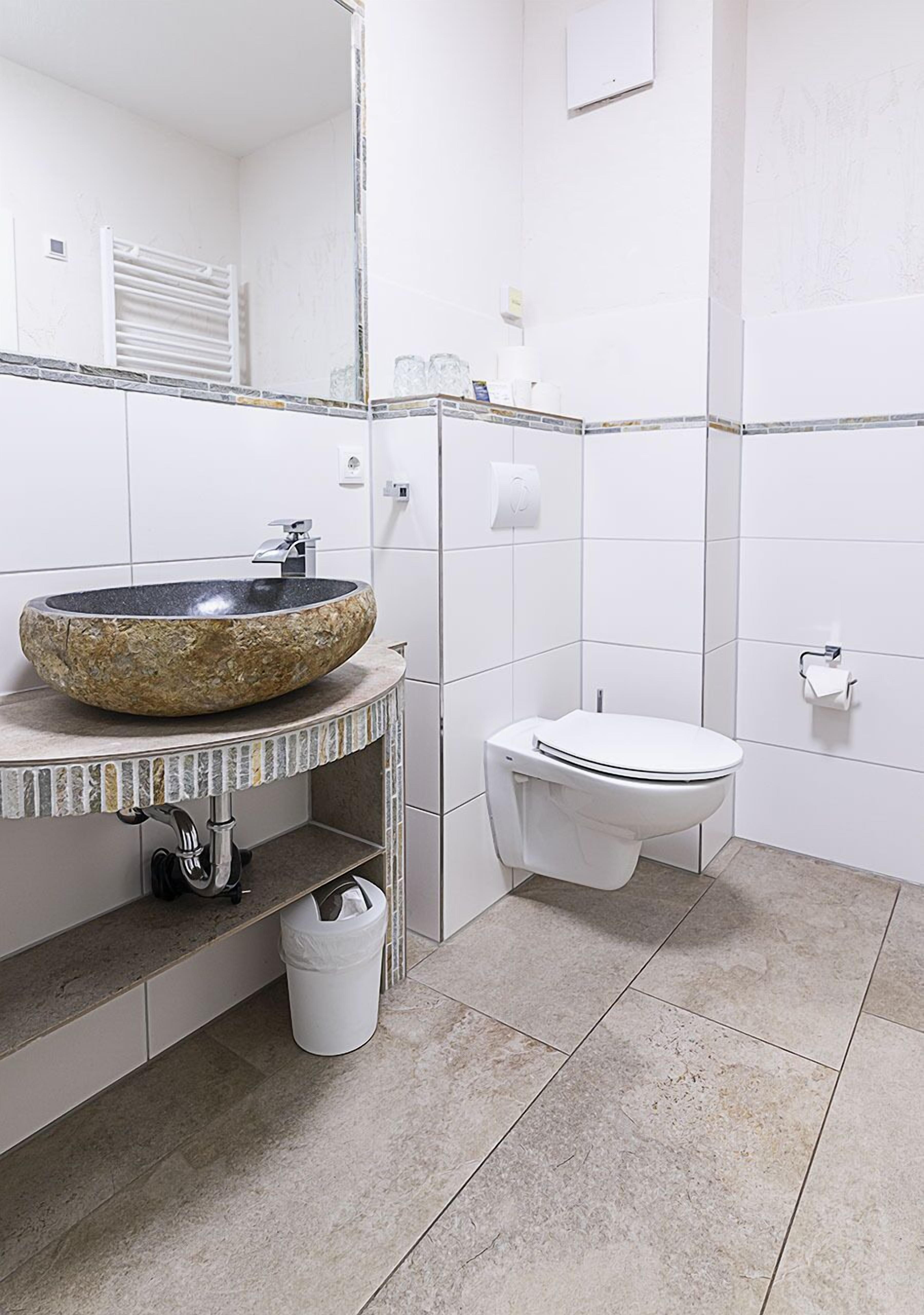 apartment | bathroom | hair dryer, towels