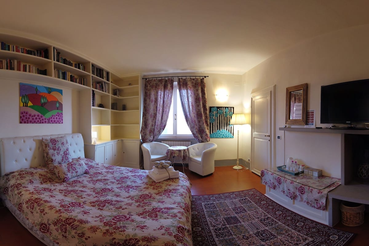 Deluxe Room, 2 Bedrooms (Biblioteca) | 1 bedroom, desk, cribs/infant beds, free WiFi