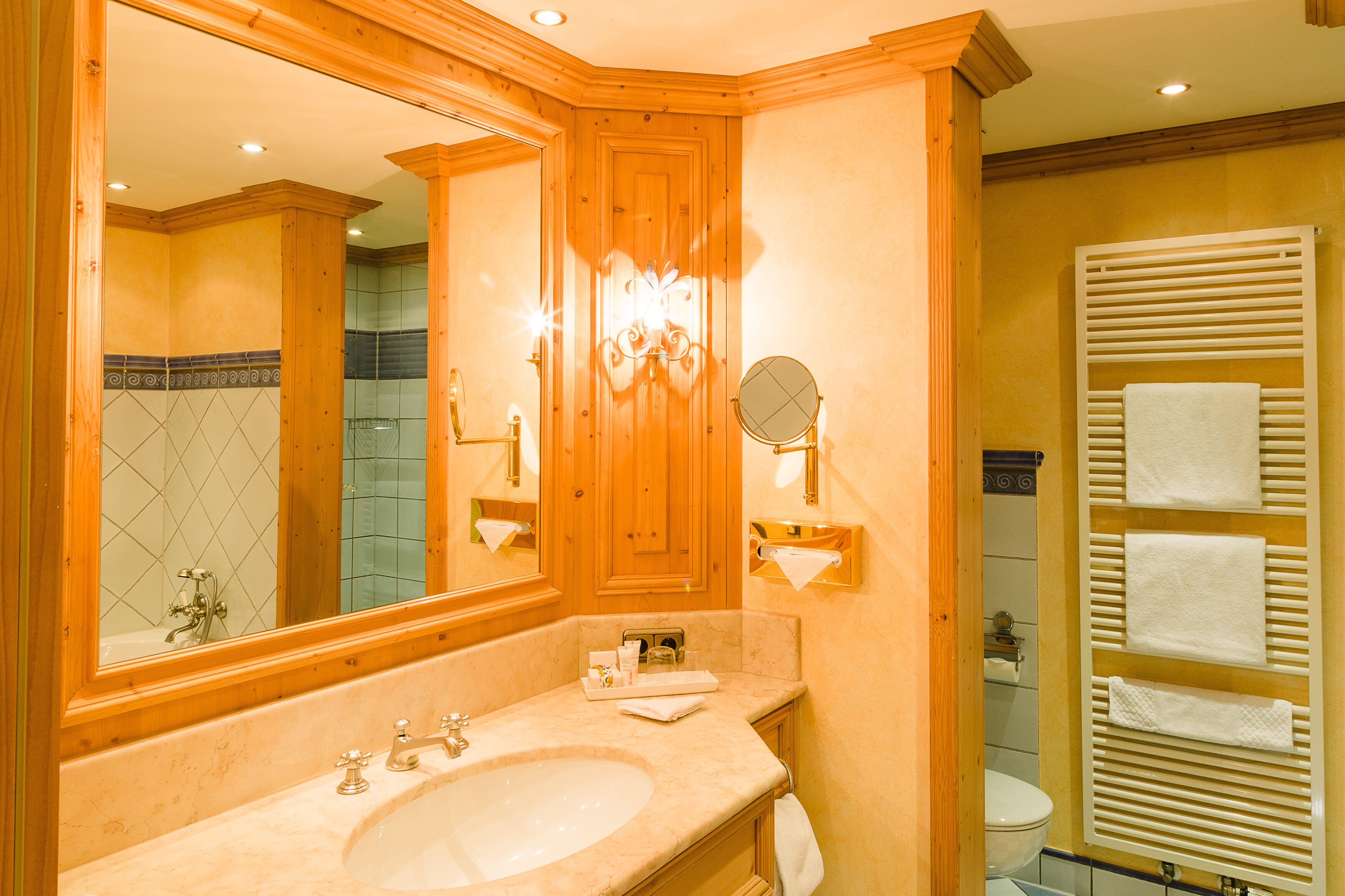 deluxe double room | bathroom | slippers, towels